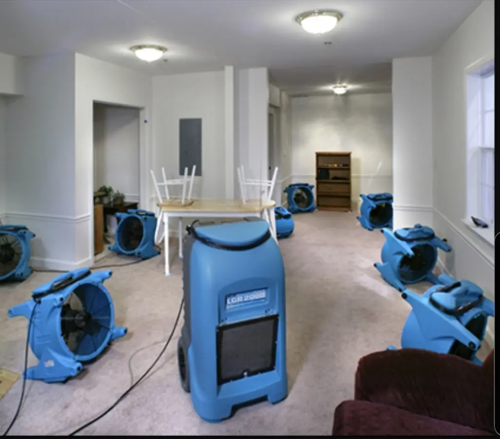 Air movers and dehumidifier setup for Water Damage Restoration in Elko
